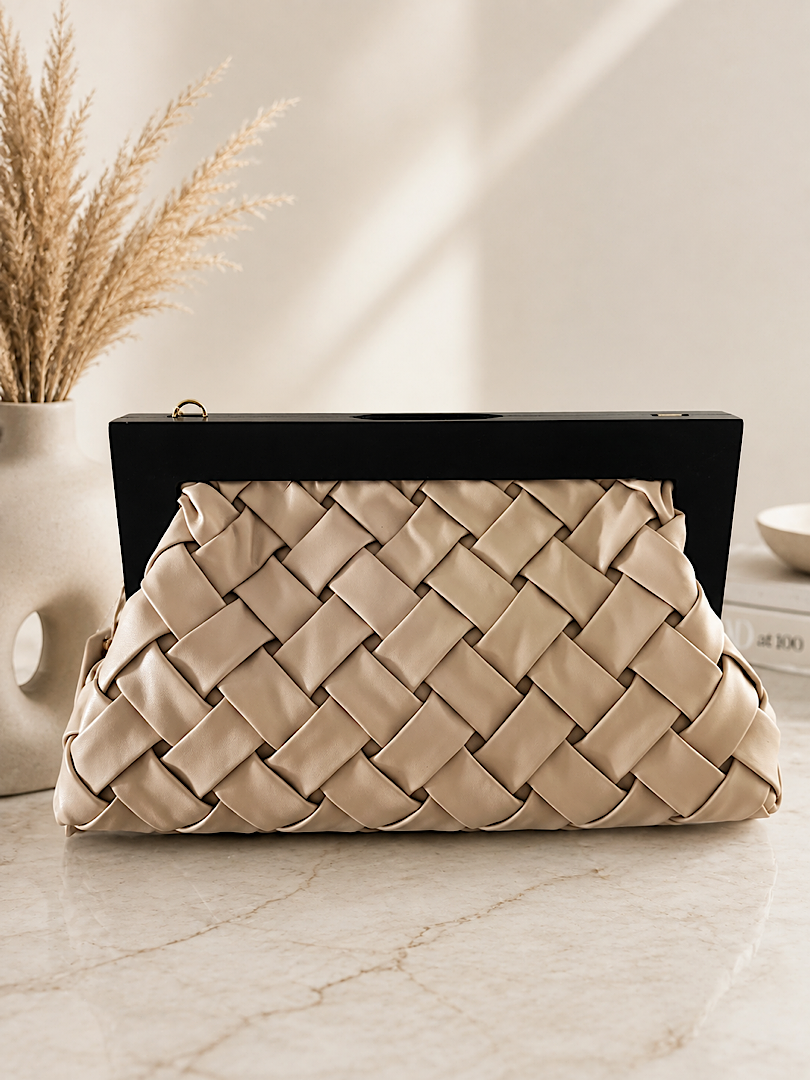 Alba ivory woven frame clutch in vegan leather with gold hardware, magnetic closure, detachable chain strap, and fabric-lined interior with one pocket.