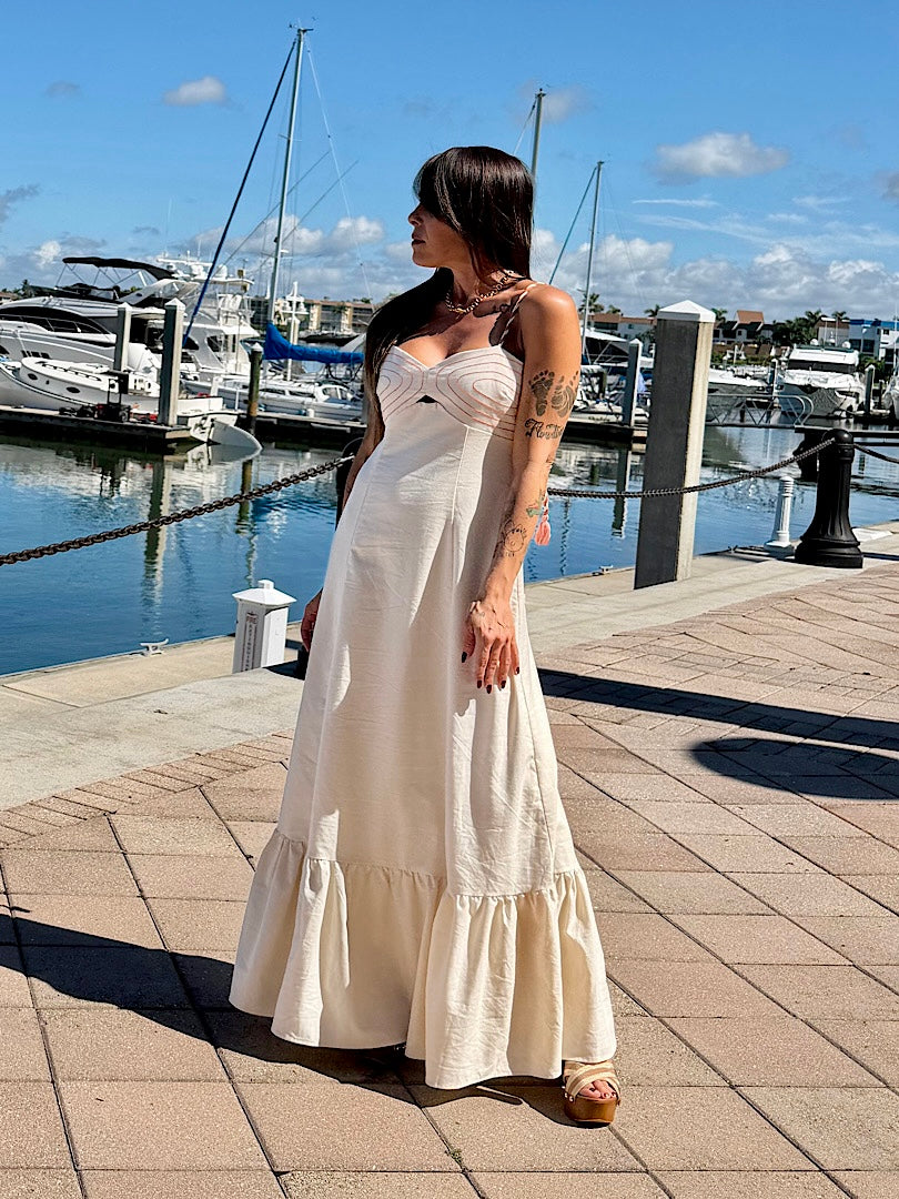 Maxi dress features a corset-inspired bodice with delicate detailing, braided shoulder straps and a romantic ruffle hem.